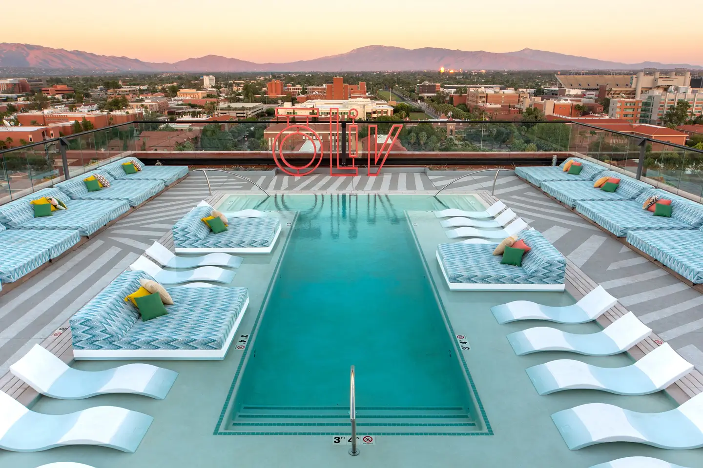 ōLiv Tucson's outdoor sundecks and rooftop pool overlooking Tucson